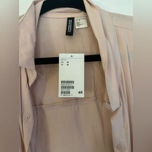 Light pink button down shirt